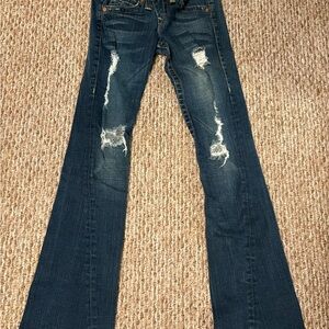 True Religion Blue Flare Jeans with Distressed Details
